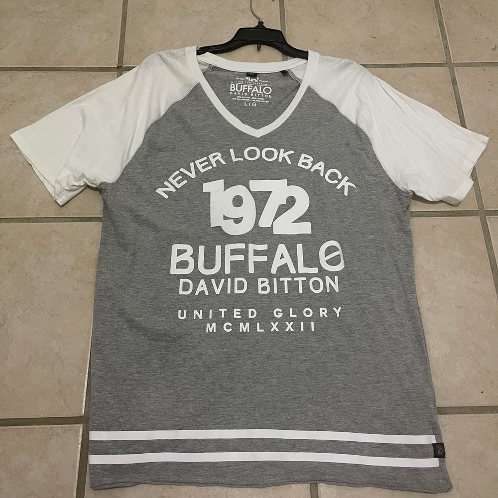 Large V-neck shirt good quality shirt not worn that much.